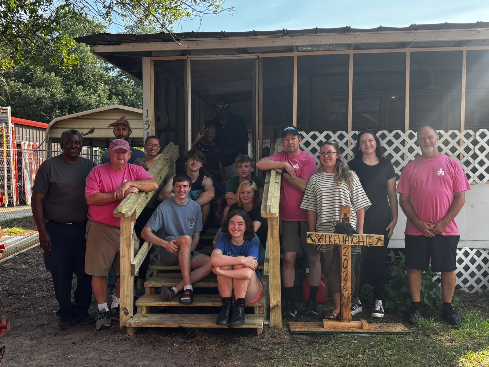 Volunteers on newly built wooden stairs at a Salkehatchie work site